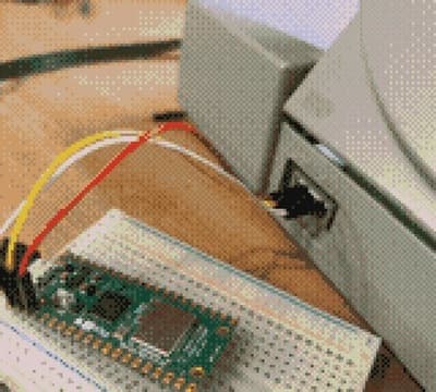 Raspberry Pi Pico 2W wired to the PS1 SIO port